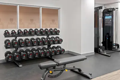 a gym with a rack of dumbbells at Hampton Inn & Suites Cleveland-Beachwood in Beachwood