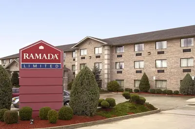 a hotel sign in front of a building at Ramada Limited - Mount Sterling in Mount Sterling
