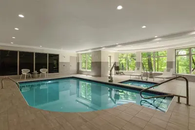 a swimming pool in a house at Hilton Garden Inn Cleveland Airport in Fairview Park