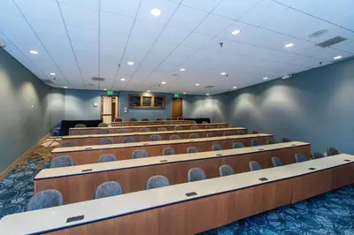 a lecture hall with rows of chairs in it at Wyndham Independence in Independence