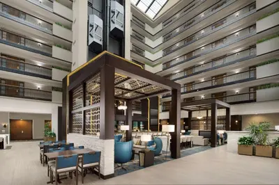 a rendering of the lobby of a hotel at Embassy Suites by Hilton Columbus in Columbus