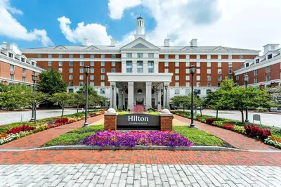 a building with a sign in front of it at Hilton Columbus at Easton in Columbus