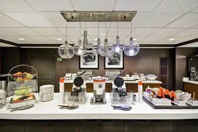 a kitchen with a counter with some food on it at Hampton Inn & Suites Columbus-Easton Area in Columbus