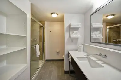 a white bathroom with a sink and a mirror at Hampton Inn & Suites Columbus-Easton Area in Columbus