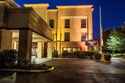 a for lease sign in front of a building at Hampton Inn Columbus I-70E/Hamilton Road in Columbus