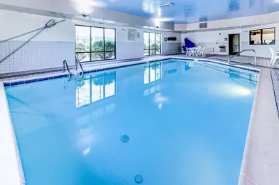 a large swimming pool with blue water at Hampton Inn Columbus I-70E/Hamilton Road in Columbus
