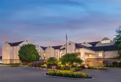 a rendering of the front of a hotel at Homewood Suites Columbus - Airport in Columbus