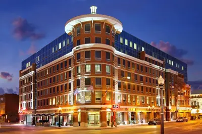a large building on a city street at night at Hampton Inn & Suites Columbus-Downtown, Ohio in Columbus