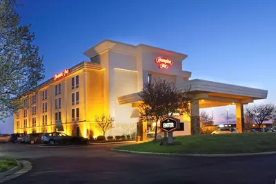 a hotel with a stop sign in front of it at Hampton Inn Columbus-International Airport in Gahanna