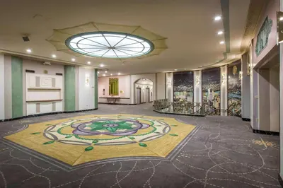 a lobby with a large mandala on the floor at Hilton Cincinnati Netherland Plaza in Cincinnati