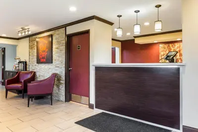 a bar in a hospital lobby with chairs at Red Roof Inn Dry Ridge in Dry Ridge