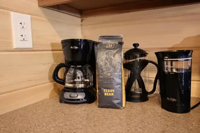 two coffee makers and a blender on a counter at The Cayo Cabin, Millersburg Ohio in Millersburg