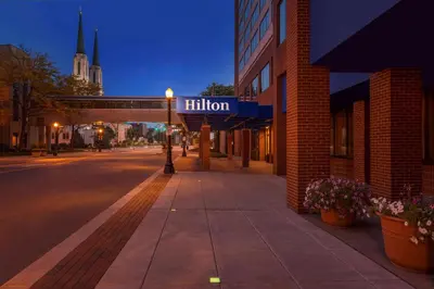 a city street with a sign that reads filler at Hilton Fort Wayne at the Grand Wayne Convention Center in Fort Wayne
