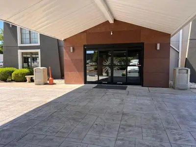 an entrance to a building with an open door at La Quinta Inn Lexington-Horse Park in Lexington