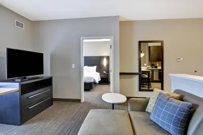 a living room with a couch and a television at Residence Inn by Marriott Cleveland Airport/Middleburg Heights in Middleburg Heights