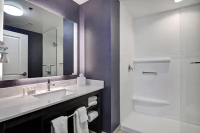 a bathroom with a sink and a shower at Residence Inn by Marriott Cleveland Airport/Middleburg Heights in Middleburg Heights