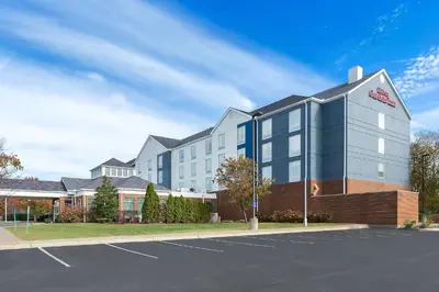 a rendering of a hotel with a parking lot at Hilton Garden Inn Lexington Georgetown in Georgetown