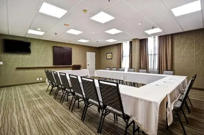 a conference room with a long table and chairs at Hampton Inn Lexington I-75 in Lexington