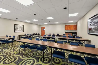 a conference room with tables and chairs in it at Hampton Inn Lancaster in Lancaster
