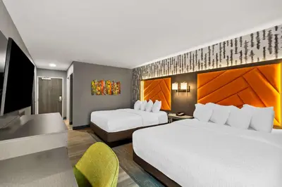 a hotel room with two beds and a desk at Hampton Inn Lexington - Georgetown I-75 in Georgetown