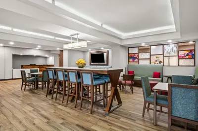 a dining room with a table and chairs at Hampton Inn Lexington - Georgetown I-75 in Georgetown