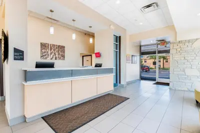 a lobby of a hospital with a reception counter at Red Roof Inn Columbus - Grove City in Grove City