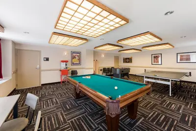 a billiard room with a pool table at Red Roof Inn PLUS+ Columbus Downtown - Convention Center in Columbus