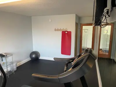 a red towel hanging on a wall in a gym at Days Inn by Wyndham Muncie -Ball State University in Muncie