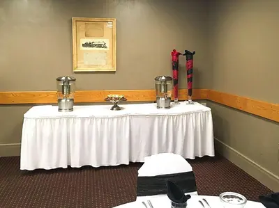 a table with a white table cloth on it at Quality Inn Montpelier in Montpelier