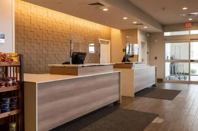 a lobby of a store with a cash register at Residence Inn by Marriott Toledo West in Toledo