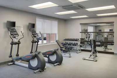 a gym with treadmills and elliptical machines at Courtyard by Marriott Columbus New Albany in New Albany