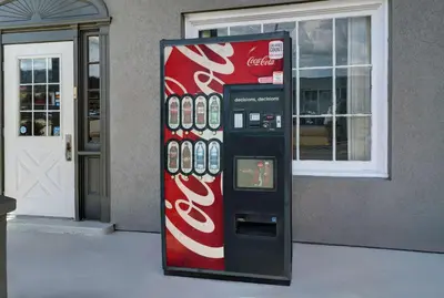 a coca cola vending machine in front of a building at Motel 6 Washington, PA in Washington