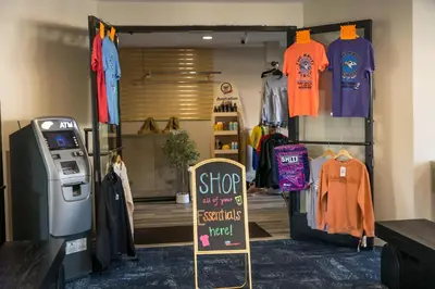 a clothing store with a sign in front of it at Islander Inn in Put-in-Bay