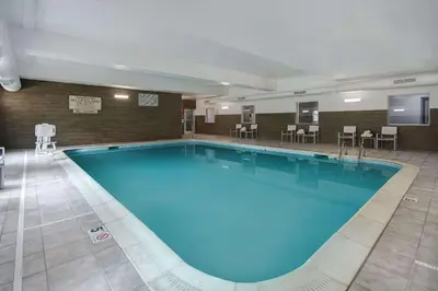 a large swimming pool in a hotel room at Country Inn & Suites by Radisson, Cincinnati Airport, KY in Hebron