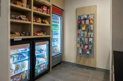 a store with two large refrigerators in a room at TownePlace Suites by Marriott Sidney in Sidney