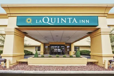 a building with a sign that reads la quinta inn at La Quinta Inn by Wyndham Toledo Perrysburg in Perrysburg