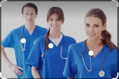a group of three doctors in blue scrubs at Short Term Rentals Little Italy Cleveland in Cleveland