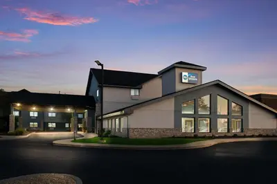 a building with a sign on the side of it at Best Western Fort Wayne I-69 North in Fort Wayne
