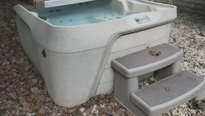 a bath tub with a toilet and a sink at The Highlander - Rustic Mountain Yurt in Genoa