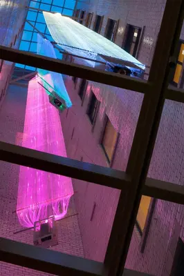 a view from a window of a building with pink lights at 21c Museum Hotel Cincinnati in Cincinnati
