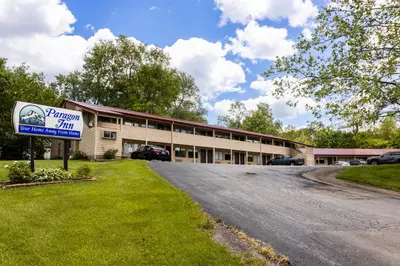 a parking lot in front of a building at Paragon Inn Hillsboro in Hillsboro
