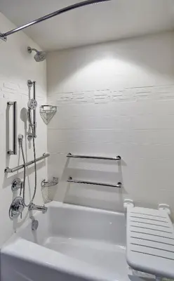 a white bathroom with a sink and a shower at Residence Inn by Marriott Cleveland University Circle/Medical Center in Cleveland