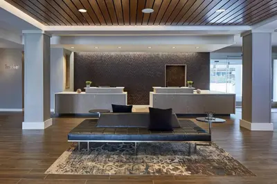 a lobby with a bench in the middle of a room at Residence Inn by Marriott Cleveland University Circle/Medical Center in Cleveland