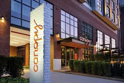 a building with a sign on the side of it at Canopy By Hilton Columbus Downtown Short North in Columbus