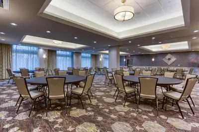 a large banquet room with tables and chairs at Drury Inn & Suites Cleveland Beachwood in Beachwood