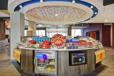 a food counter in a mall with a food cart at Tru By Hilton Beavercreek Dayton in Fairborn