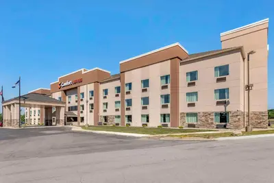 a rendering of a hotel with a parking lot at Comfort Suites Fort Wayne - Southwest in Fort Wayne