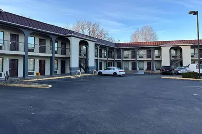 a parking lot in front of a large building at Quality Inn Ashland in Ashland