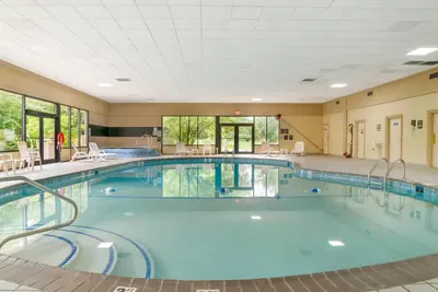 a large swimming pool in a hotel room at Quality Inn & Suites Monroe in Monroe