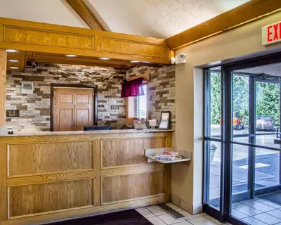a restaurant lobby with a counter and a window at Comfort Inn Bellefontaine in Bellefontaine